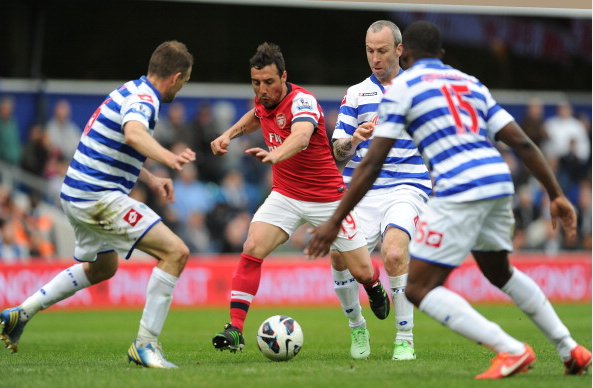 Santi Cazorla Of Arsenal Challenged By Clint Hill Shaun… News Photo - Getty Images - 168029974